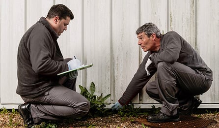 rentokil--technician-with-surveyor-outdoors 